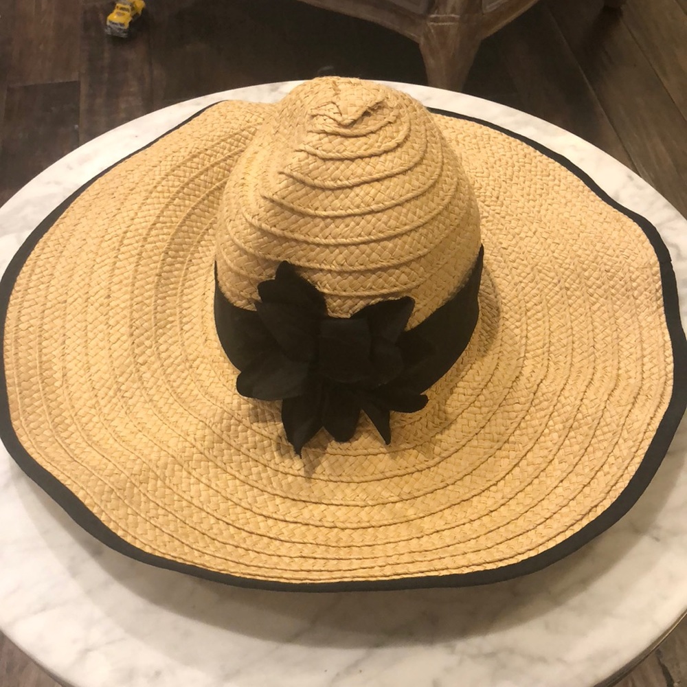 H&M straw woven sun hat with black flower design